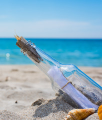 bottle on an empty beach