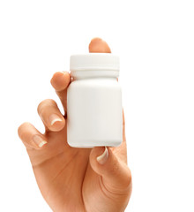 Woman's hand shows bottle for pills isolated on white background. Palm up, close up. High resolution product.