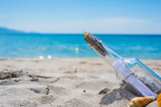 bottle on an empty beach