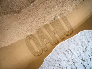 Oahu written on the beach