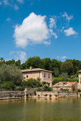 Fototapeta na wymiar Old thermal baths in the medieval village Bagno Vignoni, Tuscany, Italy