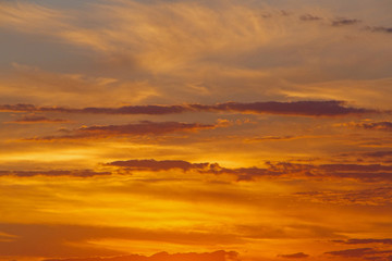 Fototapeta na wymiar view on cloudy sunset sky