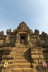 Fototapeta premium Stairs and signs at Ta Keo Angkor temple, UNESCO site in Cambodi