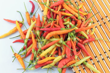Many bamboo and pepper on a white background