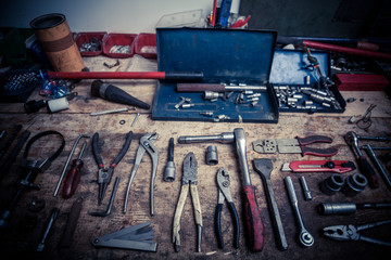 Tools on wooden plank