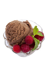 a bowl with chocolate ice cream and raspberries