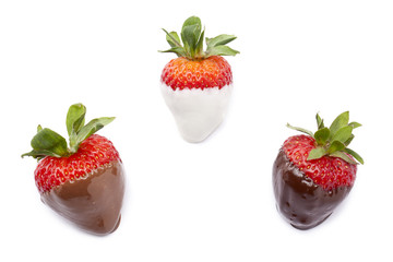 ripe strawberries with chocolate and white cream