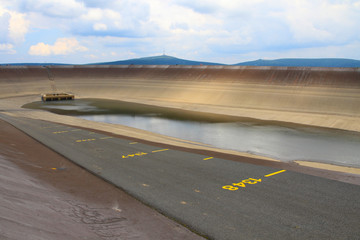 Photo of the empty water reservoire Dlouhe Strane