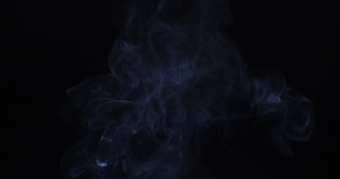 backlit smoke background over black, 4k photo
