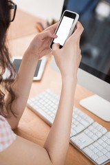 A business woman is using her phone 