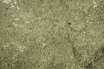 Old bright wall with cracked plaster.