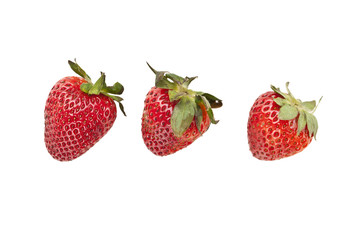 three ripe strawberries