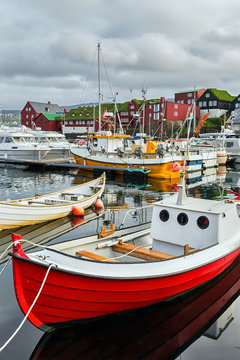 Fishing boats in the harbour of Torshavn in Faroe islands.