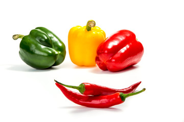 chili peppers and red, yellow and green bell pepper