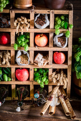 Fresh apple beer ingredients in old wooden box
