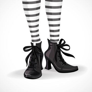 Halloween Closeup Witch Legs In Striped Stockings And Black Boot