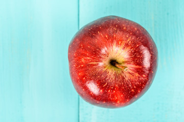 Fresh Red Delicious Apple On Turquoise Wood Table