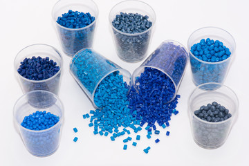 several blue plastic granulates