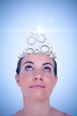 Composite image of close-up of beautiful woman looking up