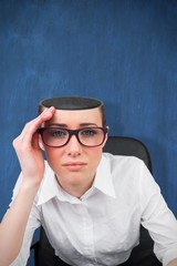 Composite image of thinking businesswoman