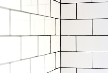 White vintage metro tiles and black grout in a bathroom - 109900982