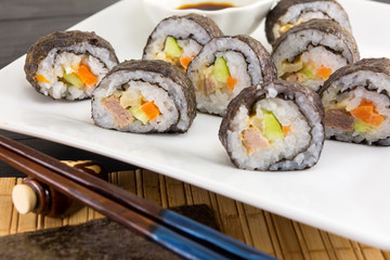 Sushi rolls and chopsticks