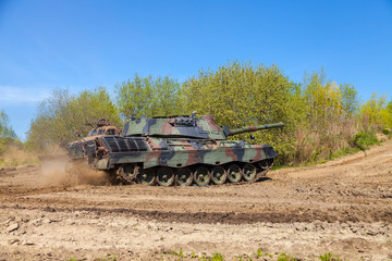 german main battle tank drives on track