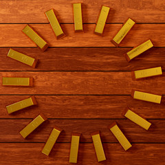 rendered gold bars in circle shape on the planks view from above