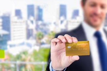 Businessman showing a creditcard