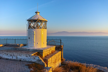 Fototapeta na wymiar Sunset over Lighthouse in Kavala, East Macedonia and Thrace, Greece