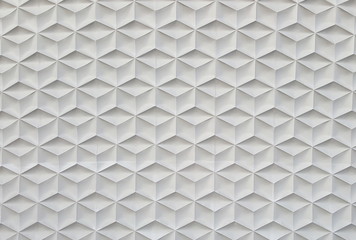 White geometric cement  wall background.