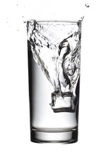 ice cube in water glass.