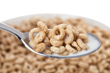 spoon of cereal with milk