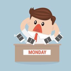 Busy businessman sitting at the table in the office and has a lo