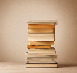 A stack of books with vintage background