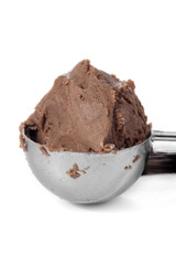 a scooper with chocolate ice cream