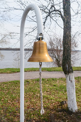 Fototapeta premium Alarm bell, on the embankment of the Volga River in the Alley of Heroes city Kozlovka Chuvash Republic, Russia