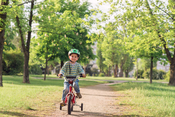 The child riding a bicycle
