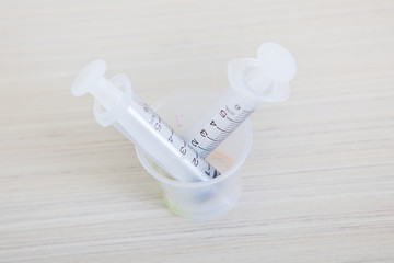 emty syrings on table in hospital room