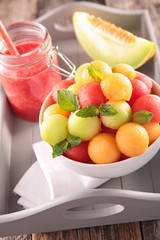 healthy breakfast with smoothie and fruit salad