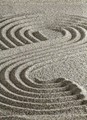 Fototapeta na wymiar Figure on the sand.