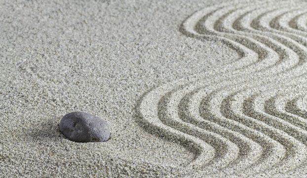 Stones and a line on the sand.