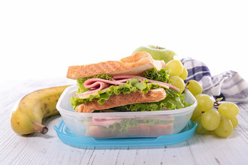 sandwich,lunch box and fruit