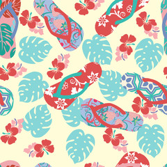 summer background with flower hibiscus and flip flops.