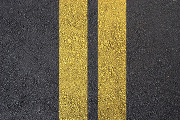 Asphalt surface with yellow line