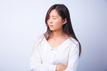 Obraz premium sad сhinese woman in white