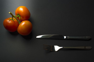 tomatoes and cutlery