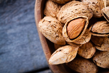 Almonds in a wooden bowl. 