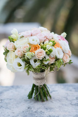 bridal bouquet of roses, freesia, eustoma