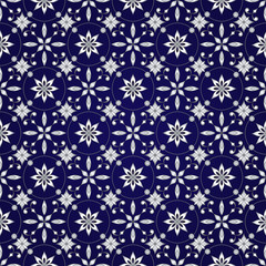 Decorative seamless silver texture on a dark blue.